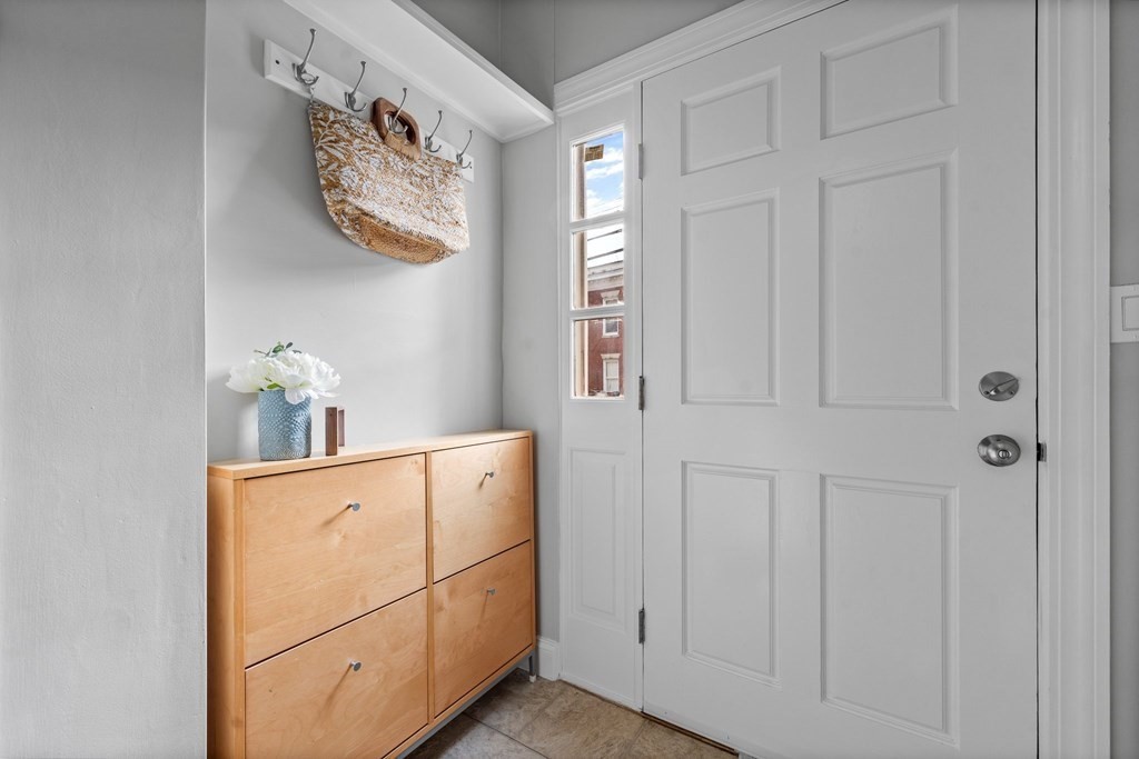 39 Leamington Road, Unit 39 Boston, MA 02135 - Photo 27 of 32 a room with cabinets and wooden floor