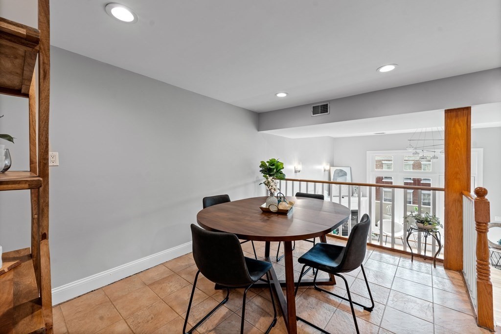 39 Leamington Road, Unit 39 Boston, MA 02135 - Photo 5 of 32 a view of a dining room with furniture
