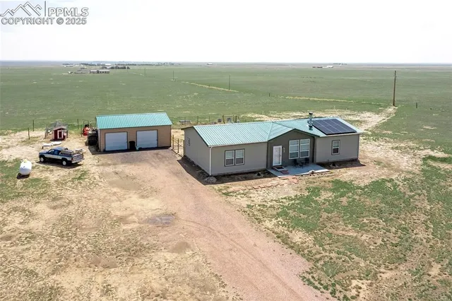 a view of a terrace with chairs