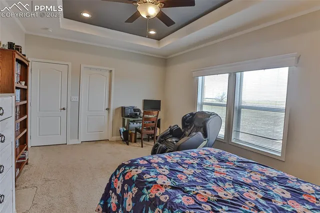 a bedroom with a bed and closet