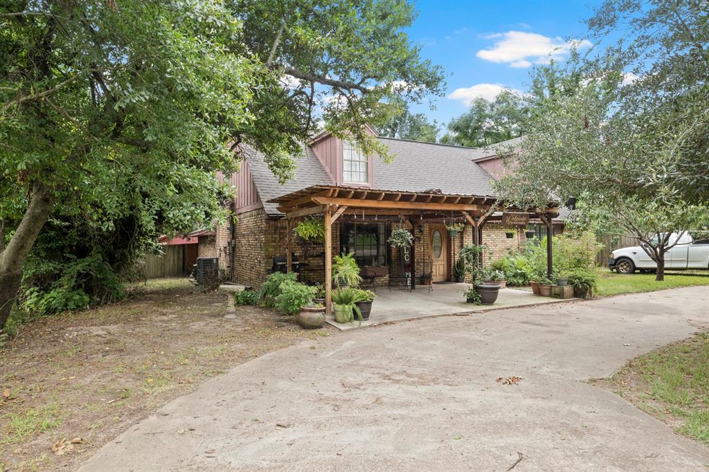 504 East 3rd Street Mount Pleasant, TX 75455 - Photo 1 of 28 a view of a house with a patio