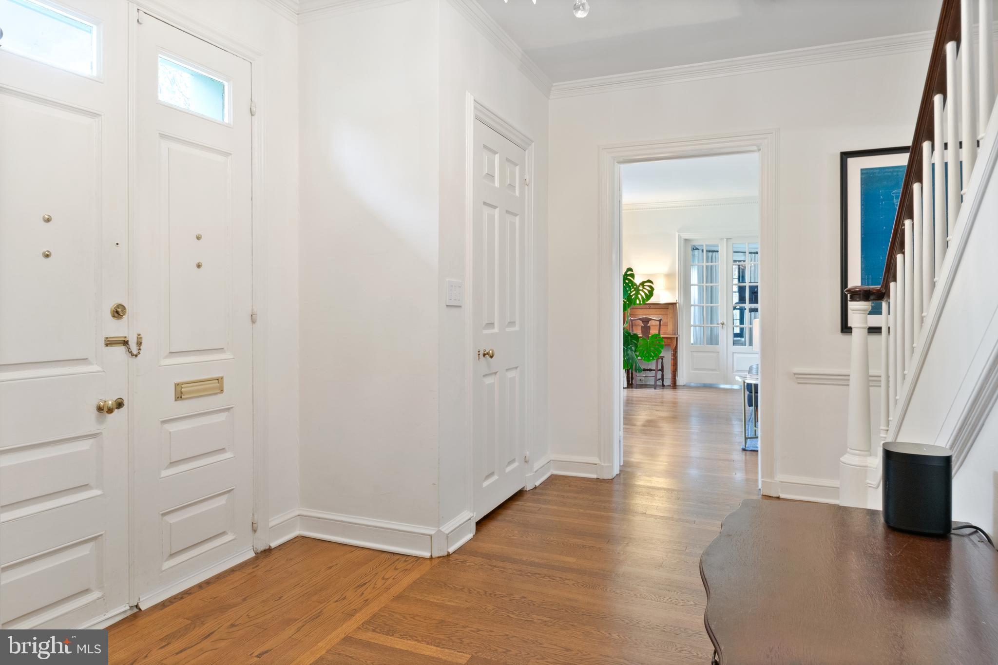 211 Lambeth Road Baltimore, MD 21218 - Photo 14 of 55 a view of a hallway with wooden floor and closet