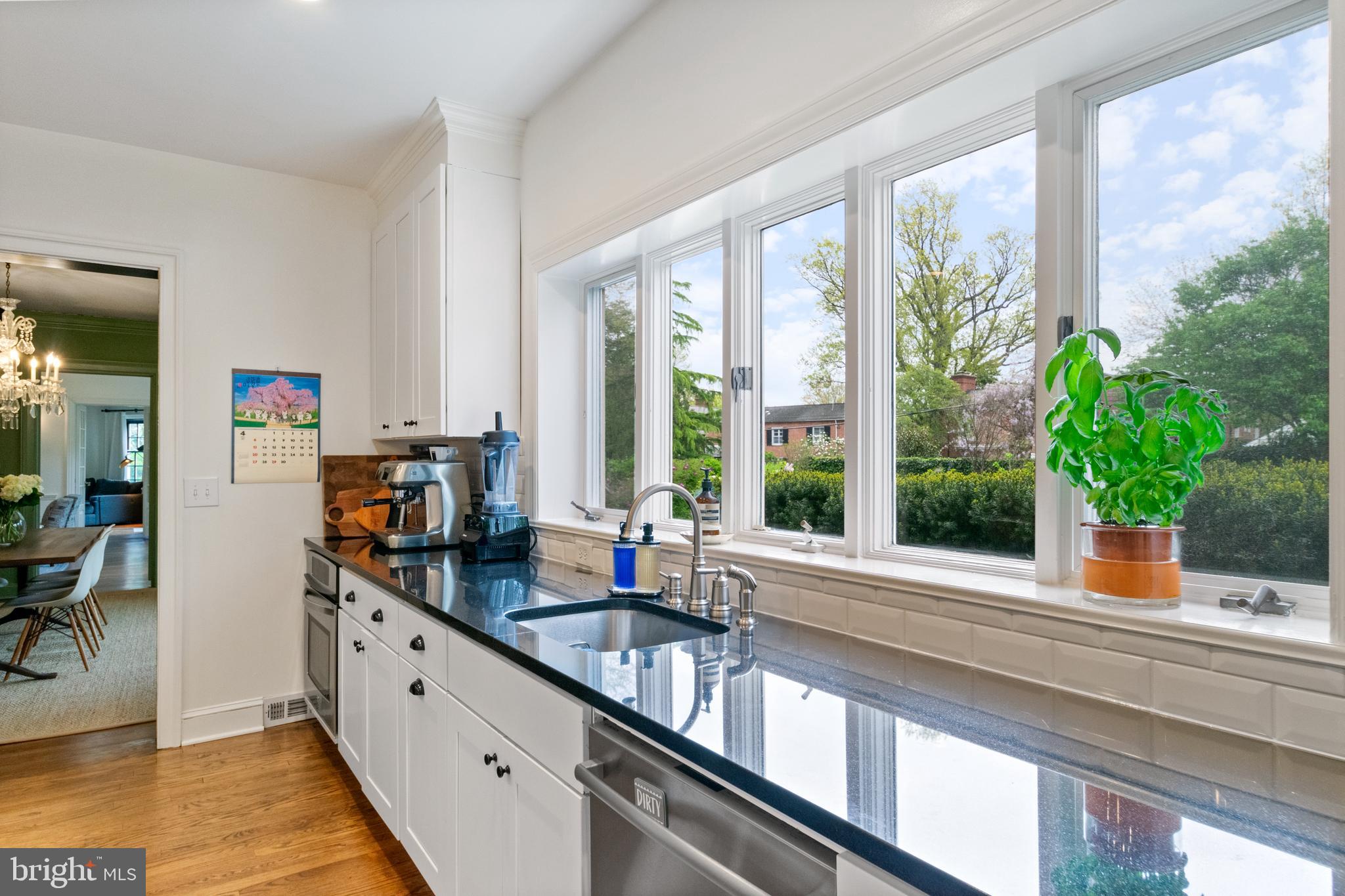 211 Lambeth Road Baltimore, MD 21218 - Photo 19 of 55 a view of kitchen with sink and potted plant