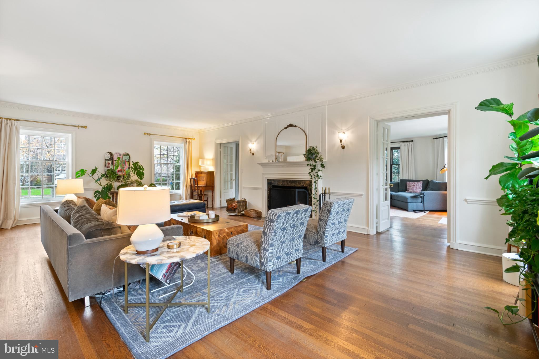 211 Lambeth Road Baltimore, MD 21218 - Photo 24 of 55 a living room with fireplace furniture and a wooden floor