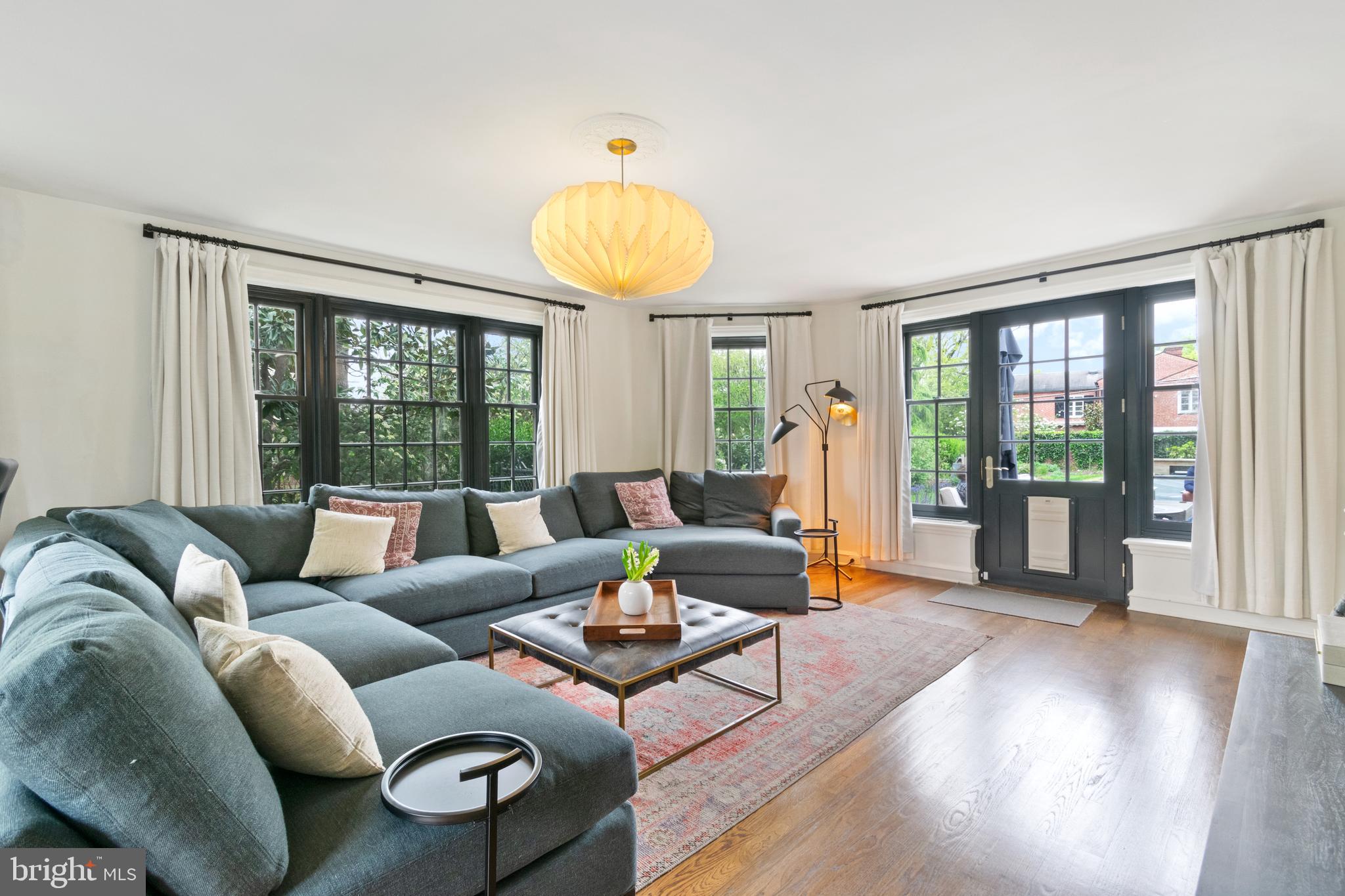 211 Lambeth Road Baltimore, MD 21218 - Photo 29 of 55 a living room with furniture and a large window