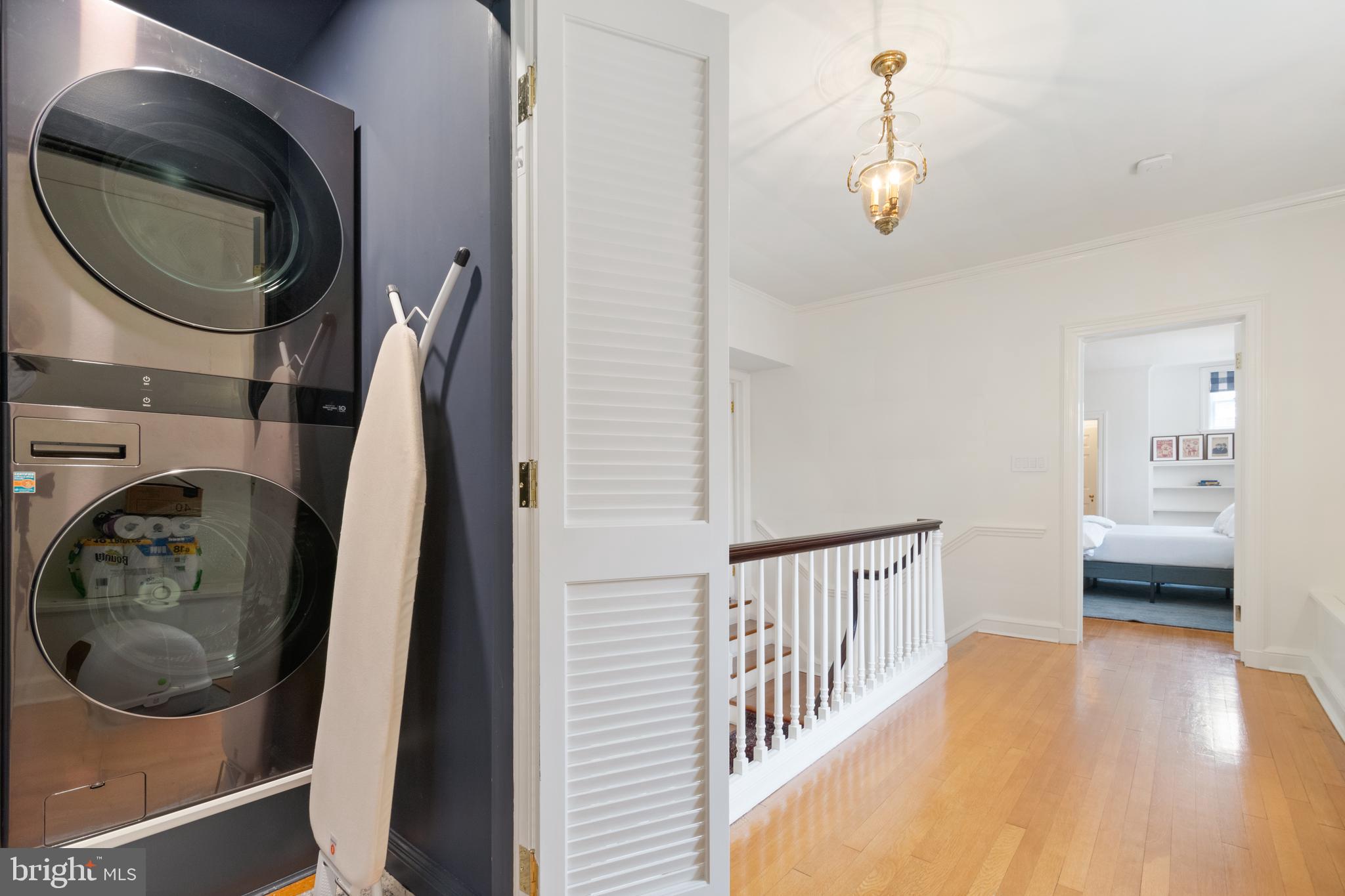 211 Lambeth Road Baltimore, MD 21218 - Photo 31 of 55 a view of a hallway with washer and dryer