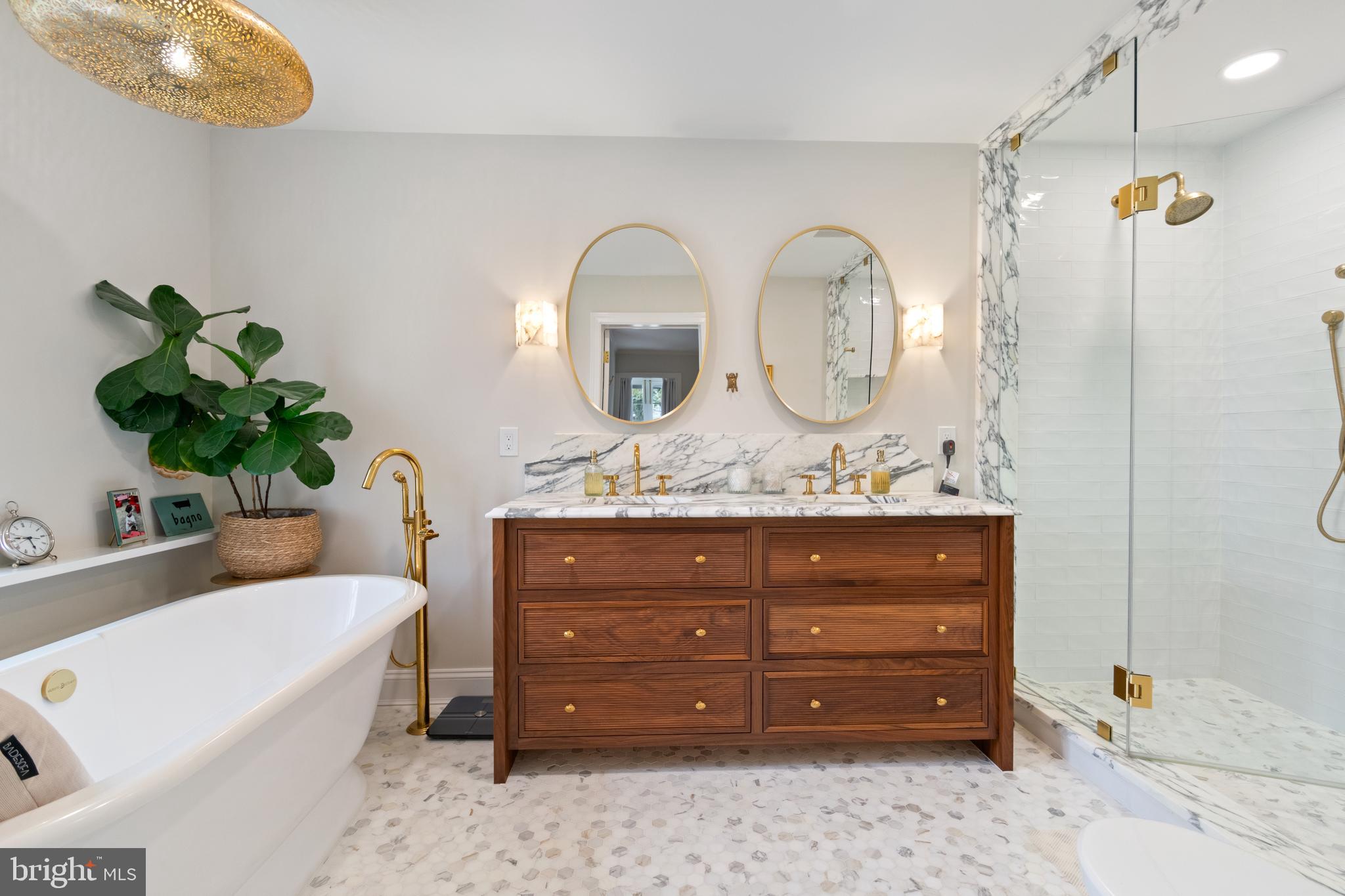 211 Lambeth Road Baltimore, MD 21218 - Photo 48 of 55 a bathroom with a granite countertop sink mirror and vanity