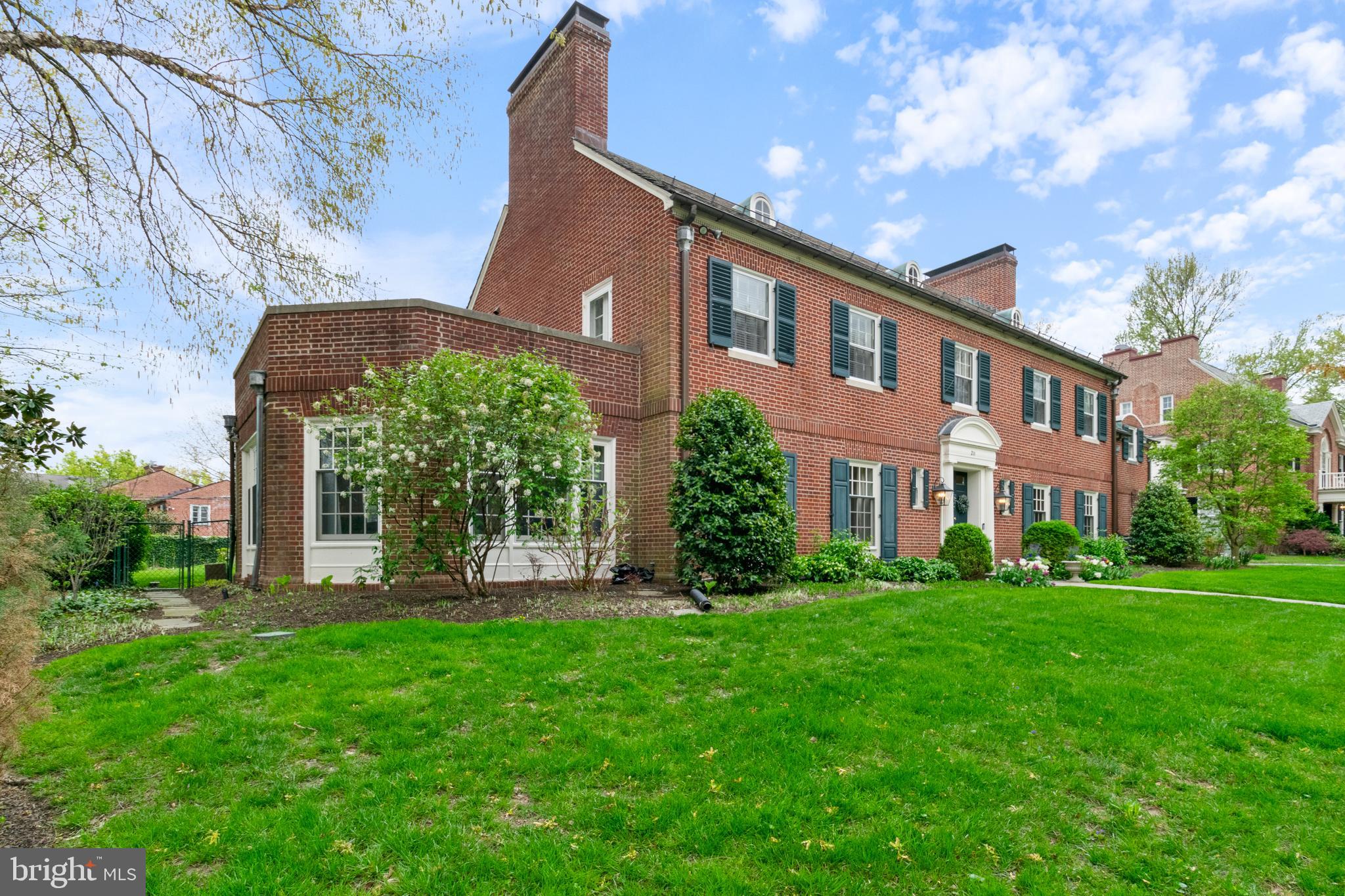 211 Lambeth Road Baltimore, MD 21218 - Photo 5 of 55 a front view of a house with garden