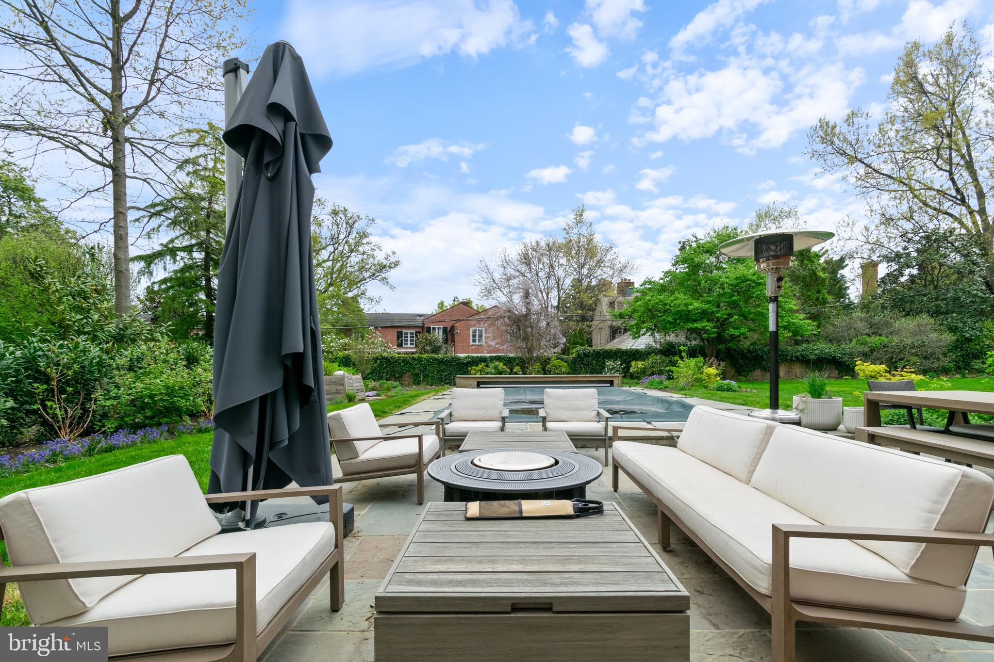 211 Lambeth Road Baltimore, MD 21218 - Photo 9 of 55 an outdoor sitting area with furniture and garden view