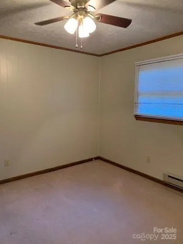 an empty room with a view of an empty room