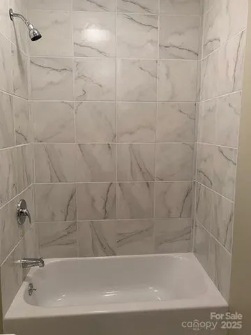 a bathroom with a bathtub