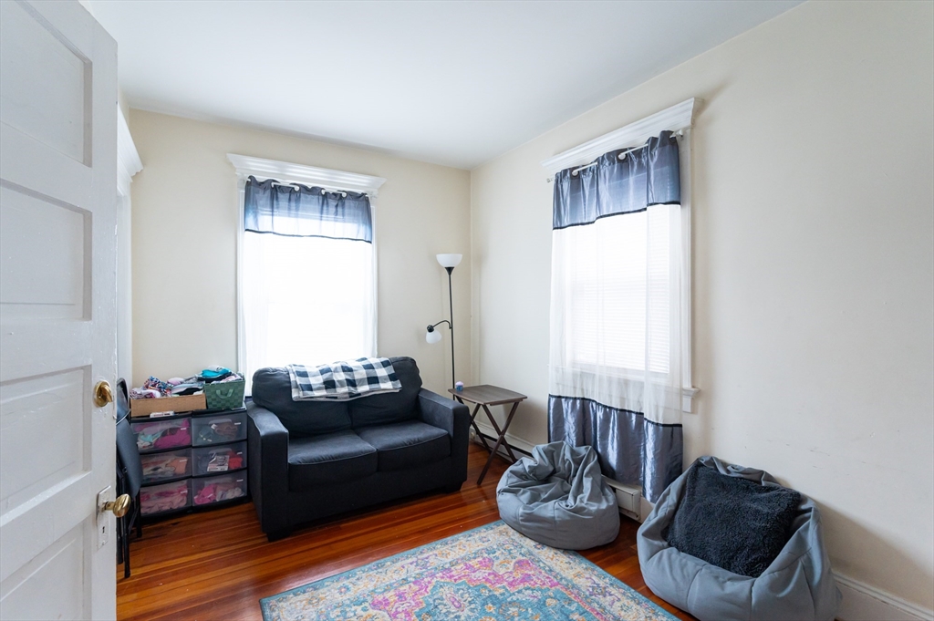 18 Edson Street Lowell, MA 01851 - Photo 13 of 41 a living room with furniture rug and window