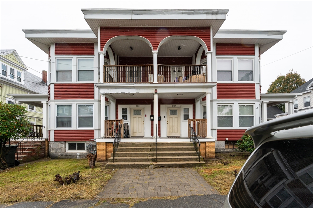 18 Edson Street Lowell, MA 01851 - Photo 2 of 41 a view of a brick building with many windows