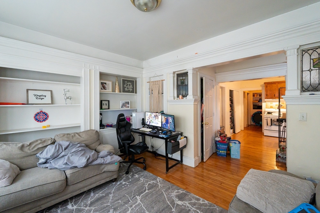 18 Edson Street Lowell, MA 01851 - Photo 29 of 41 a bedroom with furniture and a couch