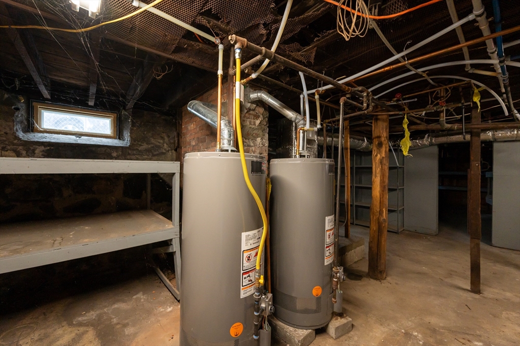 18 Edson Street Lowell, MA 01851 - Photo 36 of 41 a view of storage and utility room