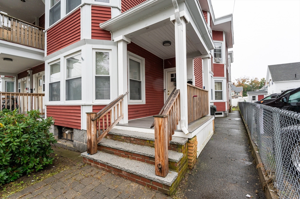 18 Edson Street Lowell, MA 01851 - Photo 41 of 41 a view of a house with a deck
