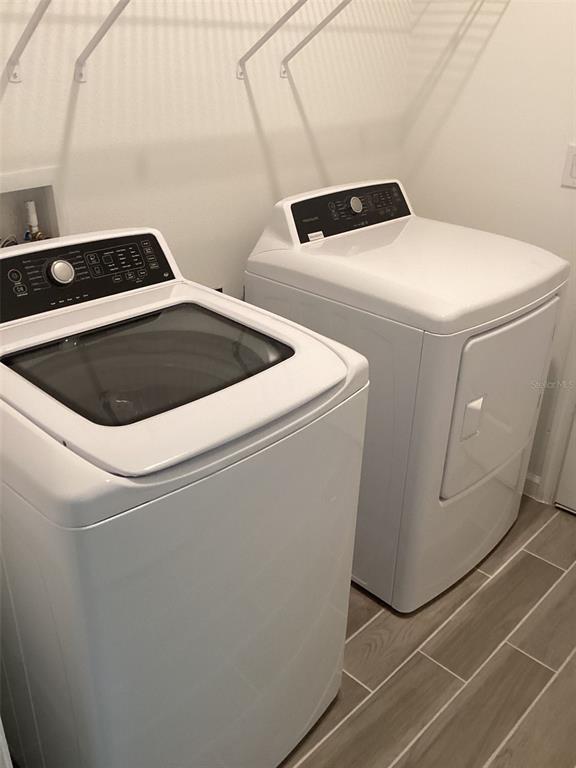 7898 Southwest 74th Loop Ocala, FL 34481 - Photo 22 of 23 a close up view of washer and dryer