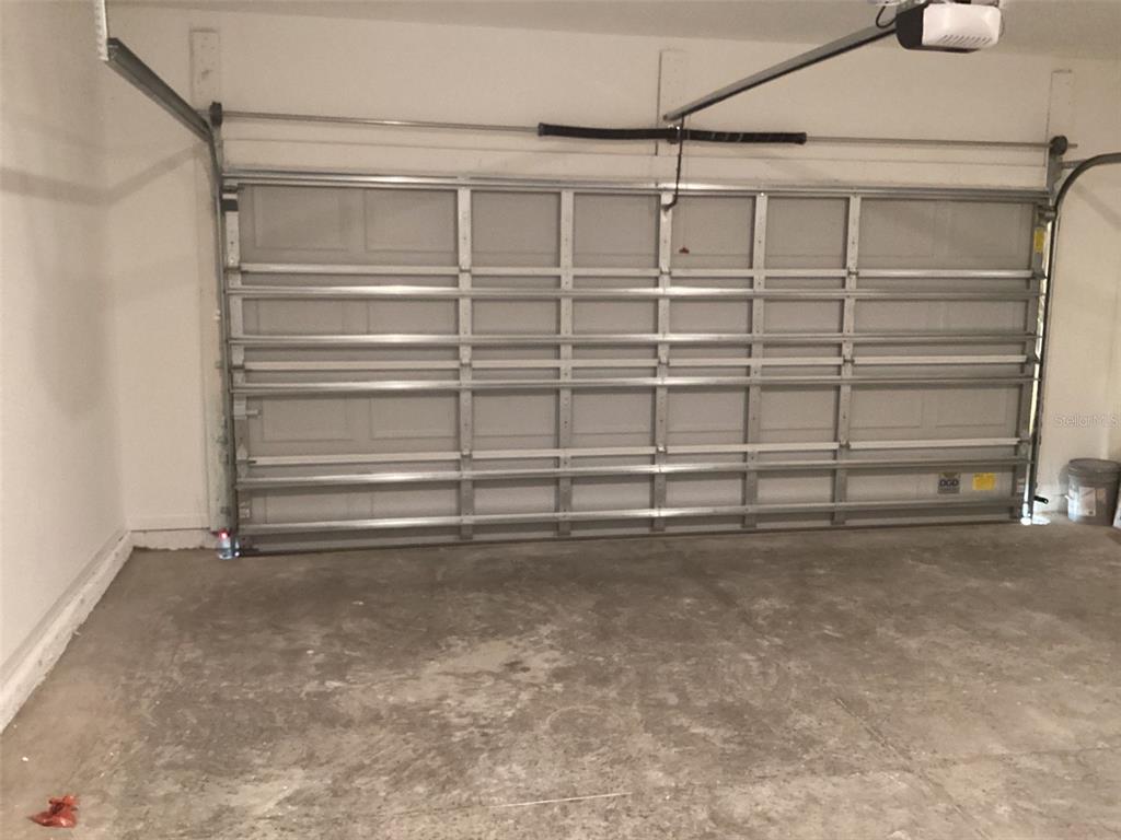 7898 Southwest 74th Loop Ocala, FL 34474 - Photo 27 of 29 a view of walk in closet with empty racks