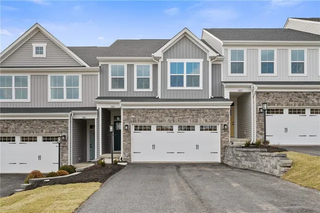 front view of a house with a street