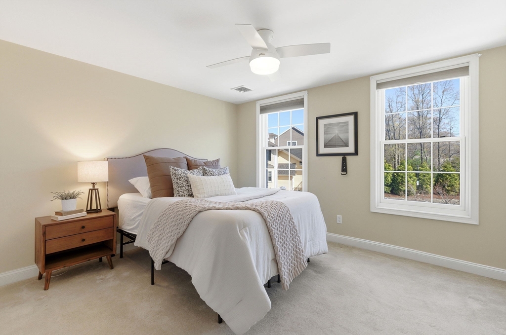 70 Great Road, Unit G Bedford, MA 01730 - Photo 10 of 15 a bedroom with bed and a window