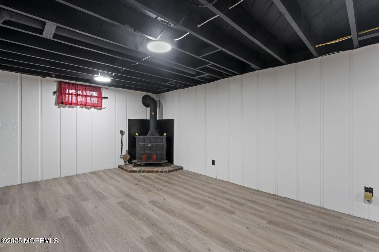 31 Phalanx Road Lincroft, NJ 07738 - Photo 20 of 28 a view of empty room with wooden floor