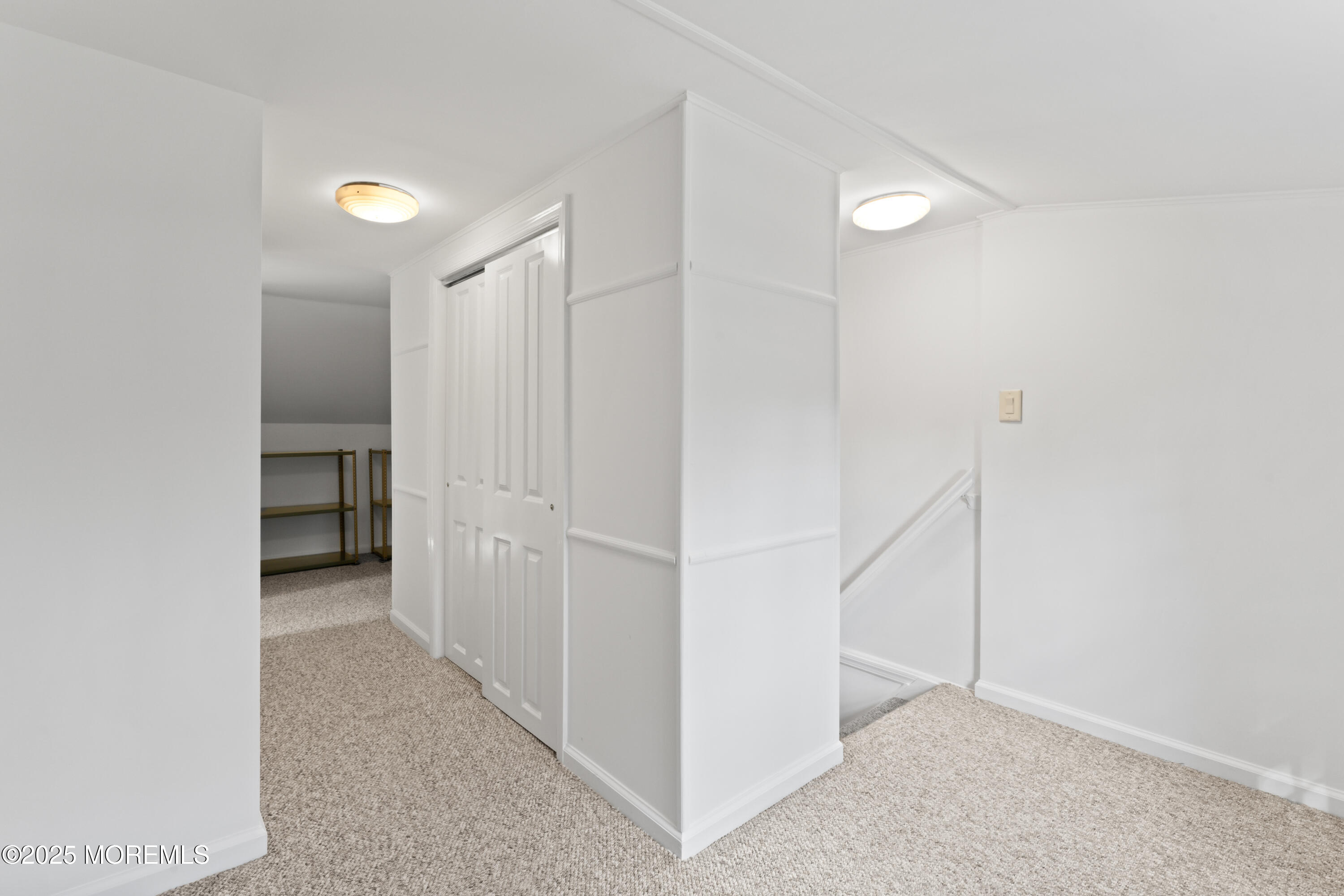 31 Phalanx Road Lincroft, NJ 07738 - Photo 23 of 28 a view of hallway with stairs