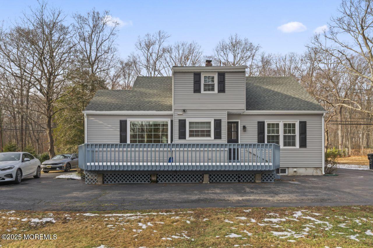 31 Phalanx Road Lincroft, NJ 07738 - Photo 3 of 28 a front view of a house with a garden