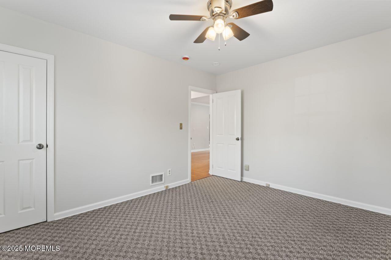 31 Phalanx Road Lincroft, NJ 07738 - Photo 7 of 28 a view of an empty room