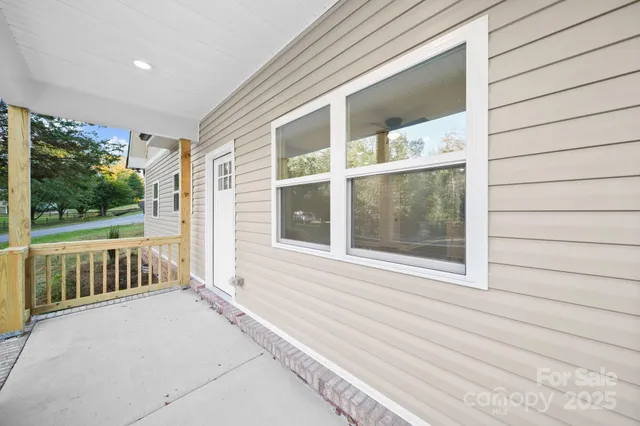 a view of a porch with a bench
