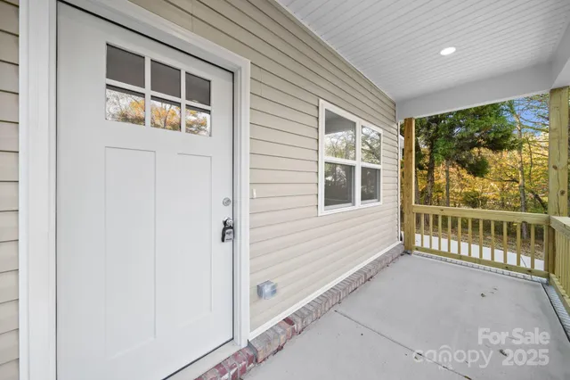 a view of a porch with a bench