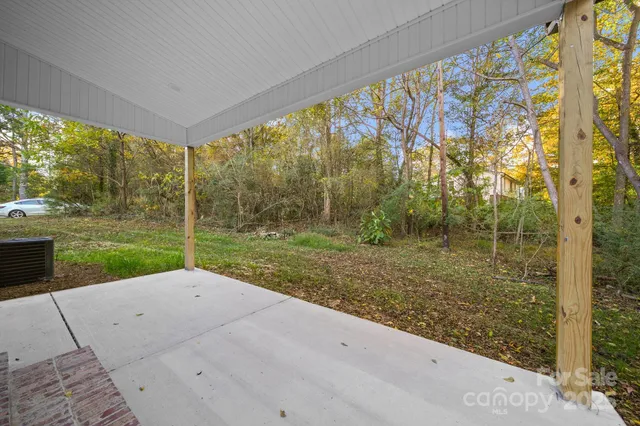 a view of a garden with an outdoor space