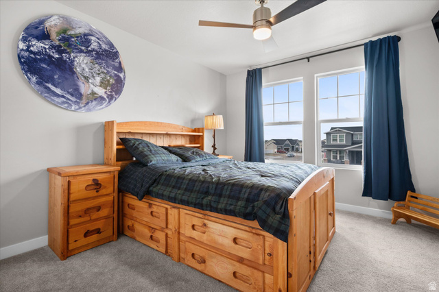 3359 Eurasian Crane Road Clinton, UT 84015 - Photo 35 of 71 Bedroom featuring carpet flooring and a ceiling fan