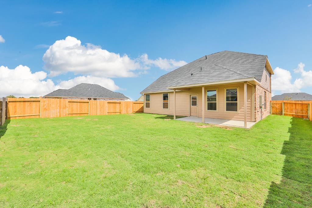 247 Sintra Lk Way Rosenberg, TX 77469 - Photo 28 of 28 a view of a house with backyard and garden