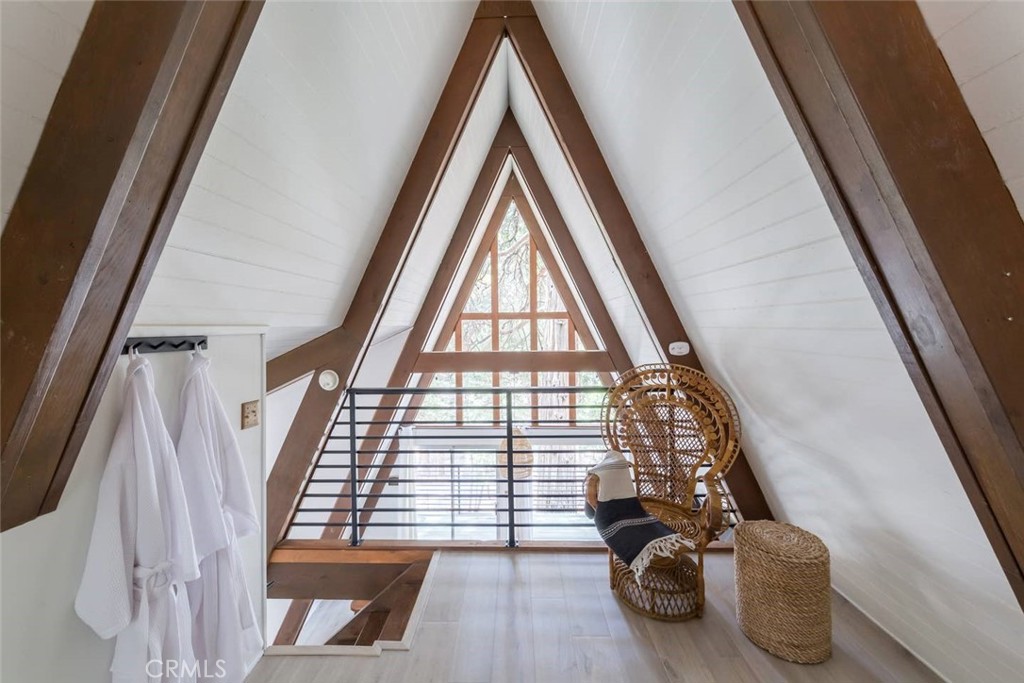 911 Kuffel Canyon Road Lake Arrowhead, CA 92385 - Photo 13 of 23 a view of livingroom with furniture and staircase