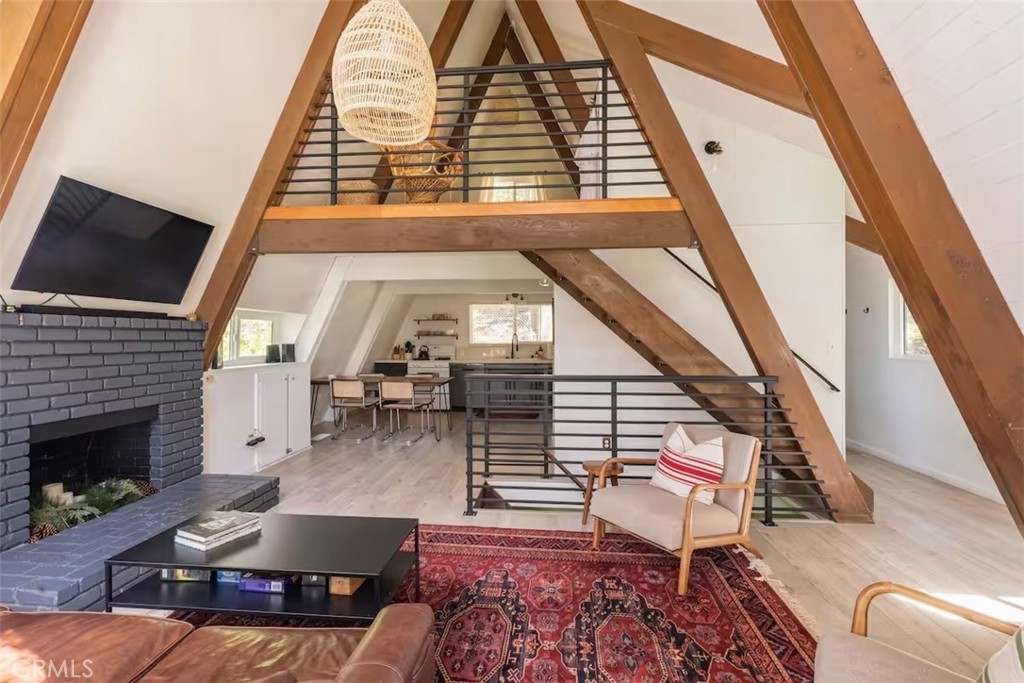 911 Kuffel Canyon Road Lake Arrowhead, CA 92385 - Photo 5 of 23 a living room with furniture