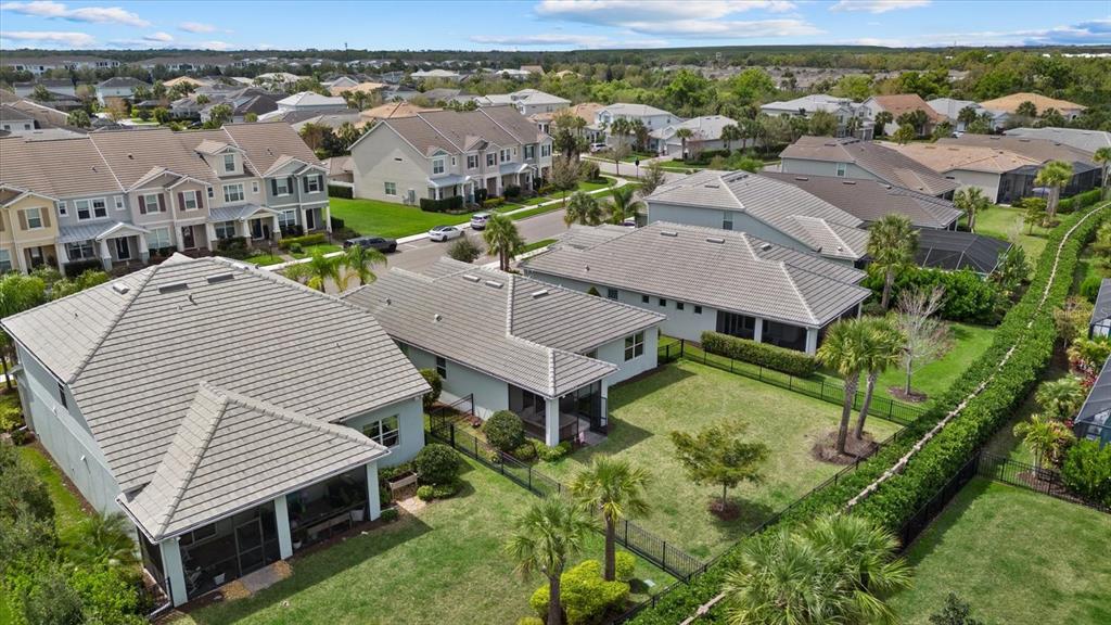 3310 Chestertown Loop Bradenton, FL 34211 - Photo 36 of 71 an aerial view of a house with a garden