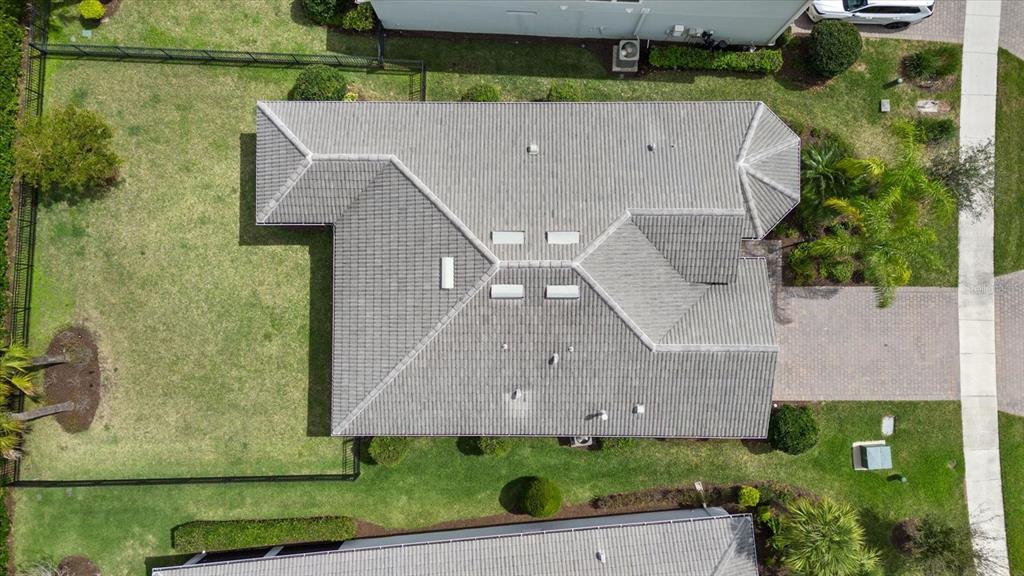 3310 Chestertown Loop Bradenton, FL 34211 - Photo 41 of 71 an aerial view of a house with a yard and a large tree