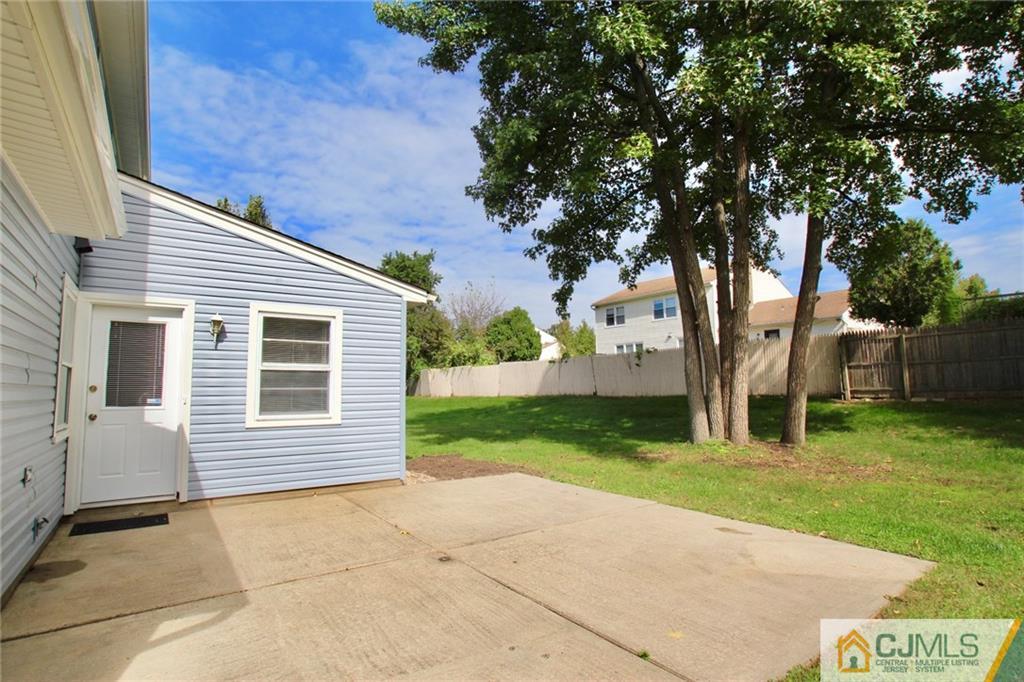 50 Roxy Avenue Edison, NJ 08820 - Photo 22 of 25 a view of a house with a yard