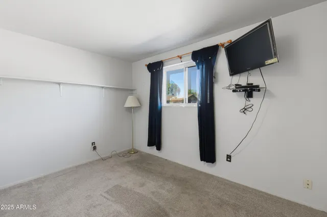 a view of a house with swimming pool and a yard