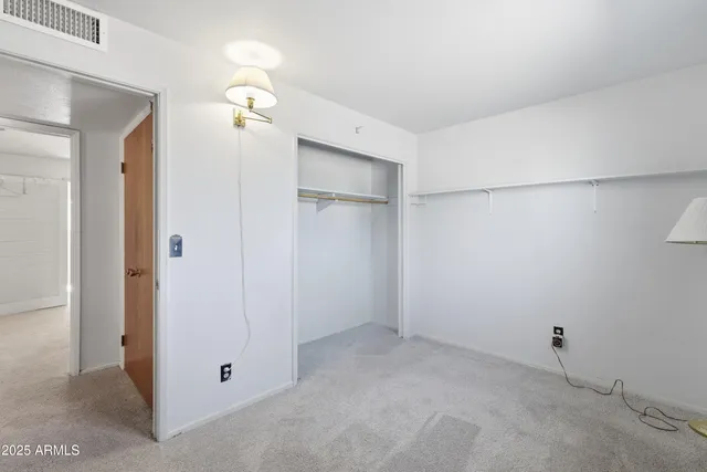 a view of a backyard with swimming pool