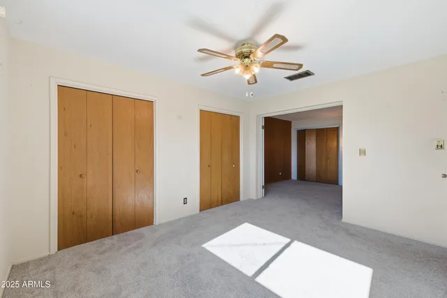 a view of city from balcony with outdoor seating