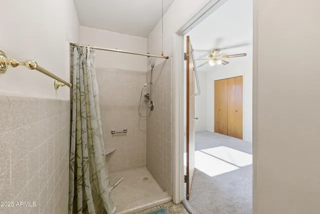 an aerial view of a house with a swimming pool