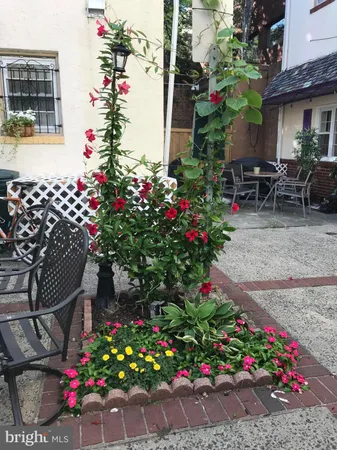 a building outdoor space with patio furniture