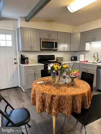 a bed room with a bed and a television