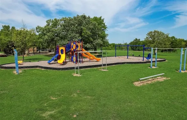a view of a park with a slide