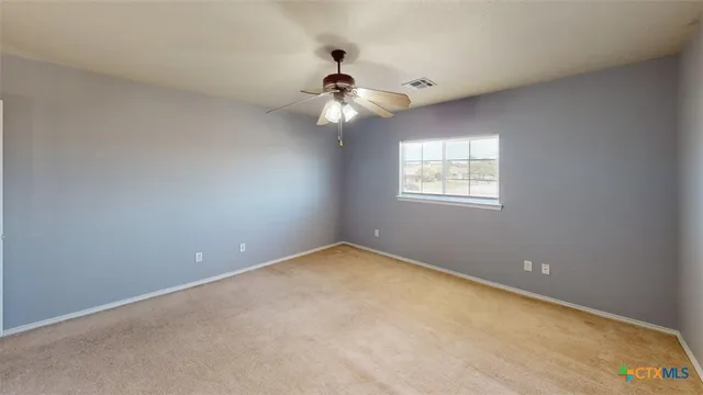 a kitchen with a wooden floor and a sink