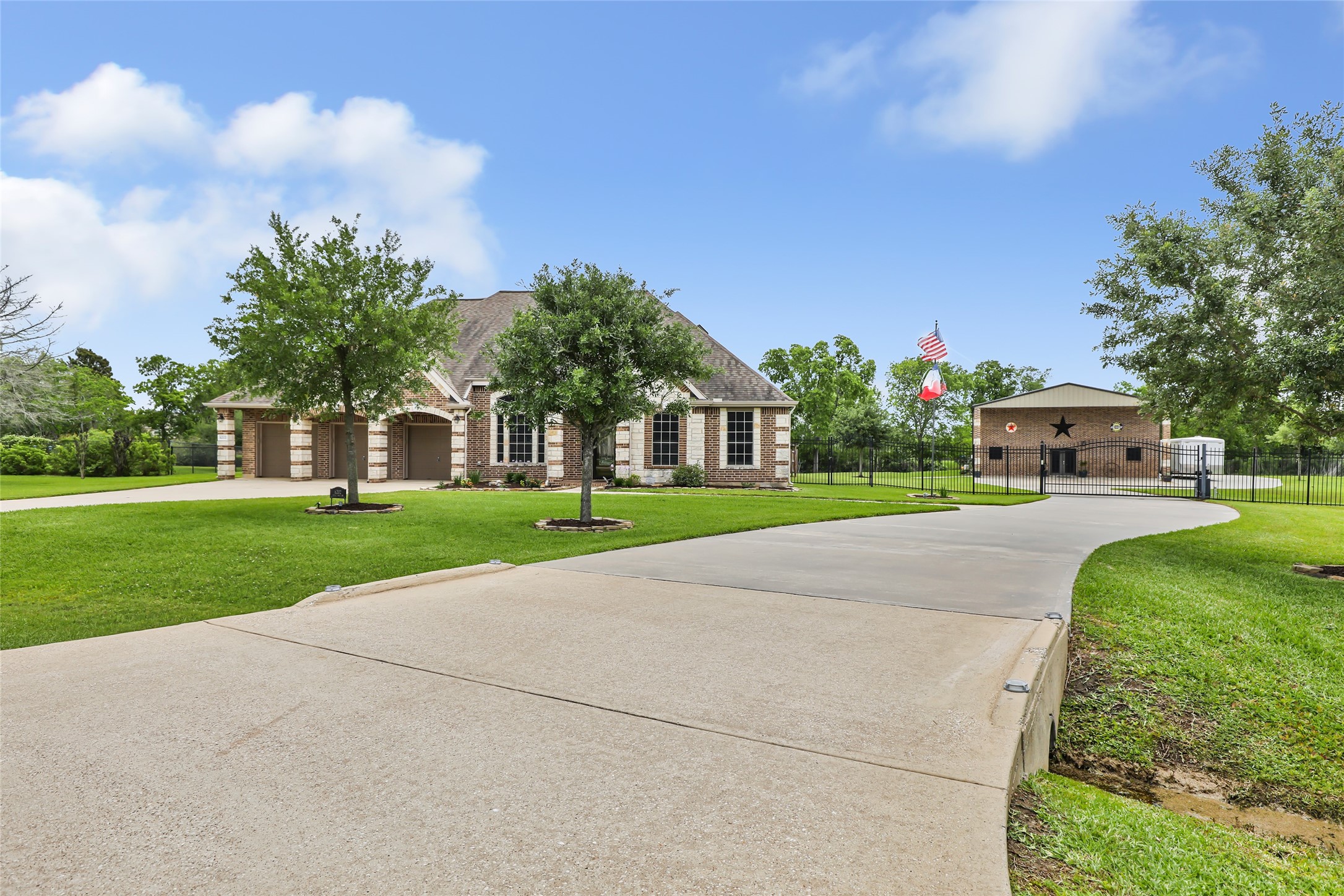 a front view of house with yard and green space