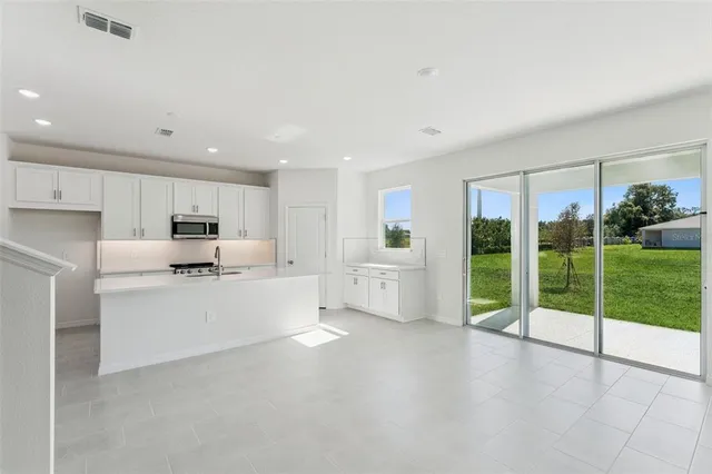 a large white room with a large window