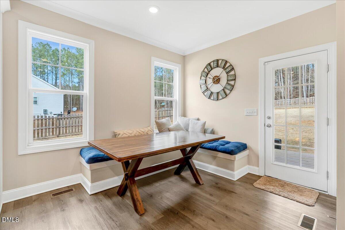 1208 Montgomery Road Franklinton, NC 27525 - Photo 13 of 62 a living room with furniture and a window