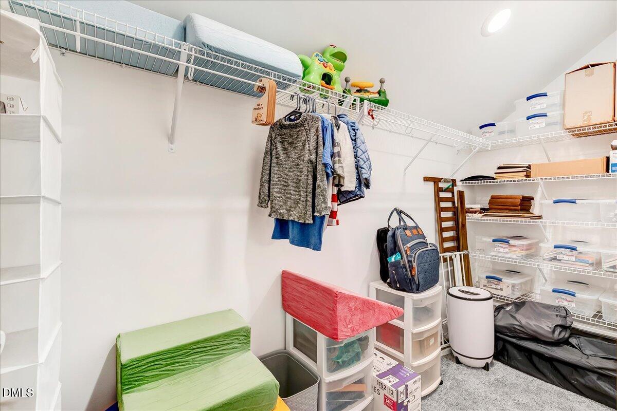 1208 Montgomery Road Franklinton, NC 27525 - Photo 25 of 62 a bathroom with a sink mirror and toilet